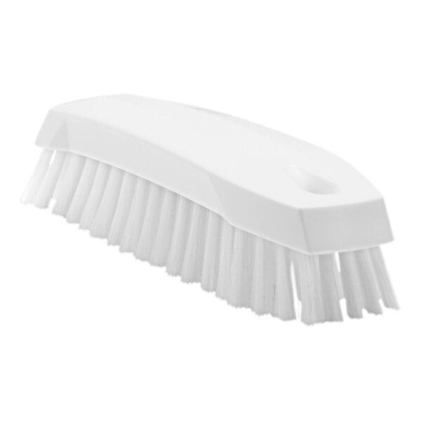 A white Vikan scrub brush with a handle and bristles.