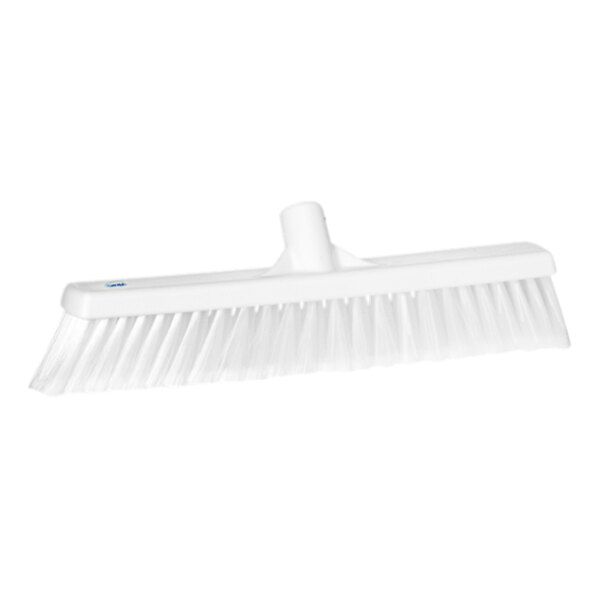 A white Vikan push broom head with soft / split bristles.