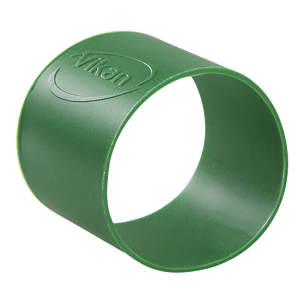 A green rubber band with the word Vikan in the middle.