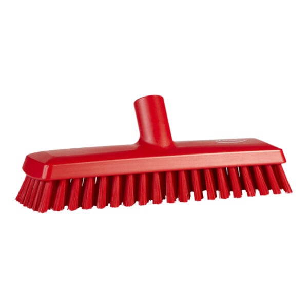 A red Vikan deck brush with bristles.