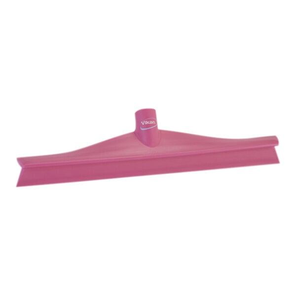A pink plastic Vikan floor squeegee with a white logo.