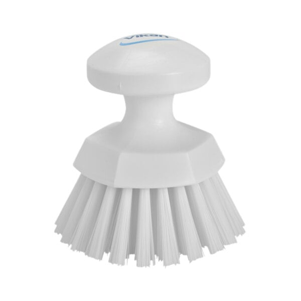 A white round Vikan scrub brush with stiff white bristles.