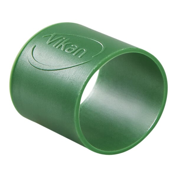 A close-up of a green Vikan rubber band with a logo on it.