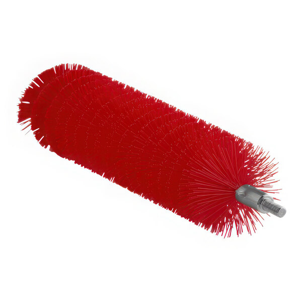 A red Vikan tube brush head with long bristles.