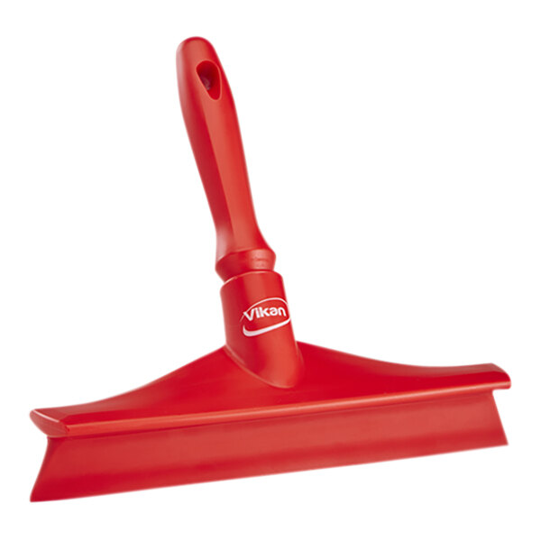 A red Vikan Ultra-Hygienic single blade rubber table squeegee with a plastic frame and handle.