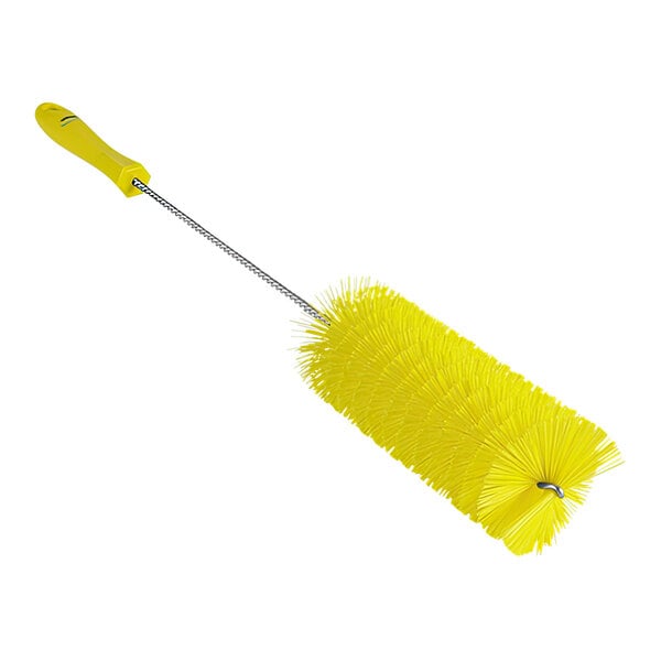 A Vikan yellow tube brush with a long handle.