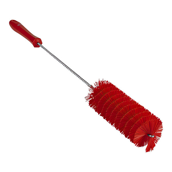 A Vikan red tube brush with a long handle.