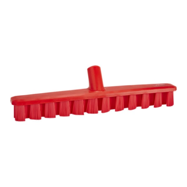 A red Vikan deck scrub brush head with stiff bristles.