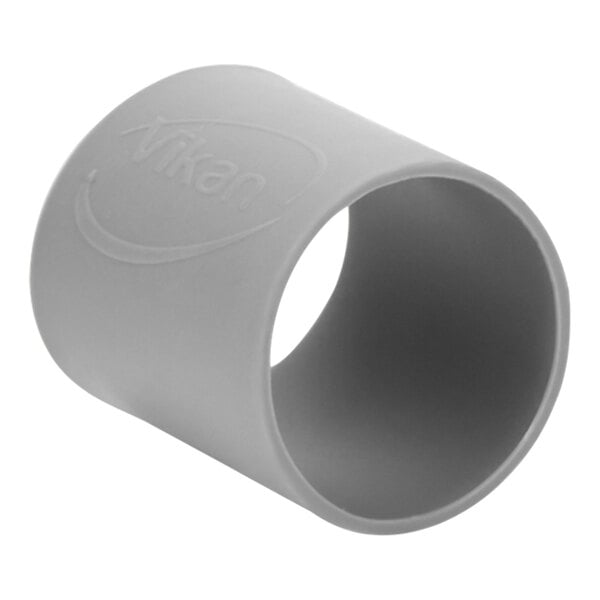 A grey cylindrical Vikan rubber band with a logo.