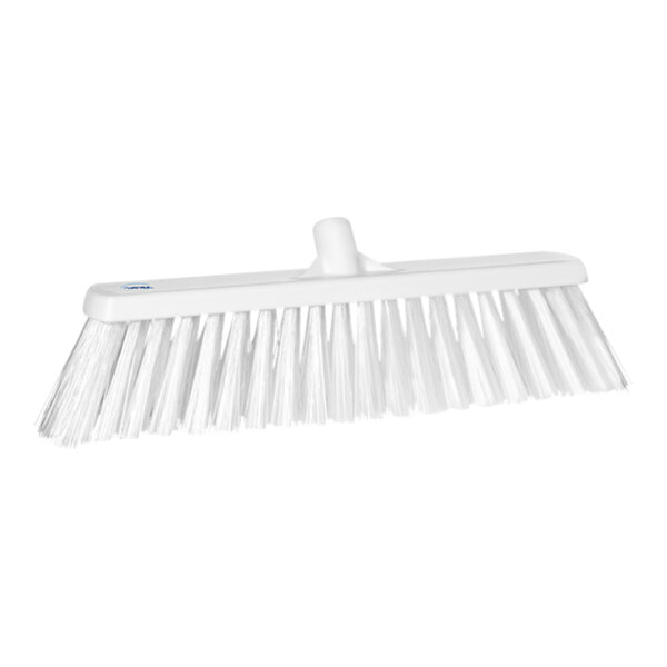 A Vikan white push broom head.