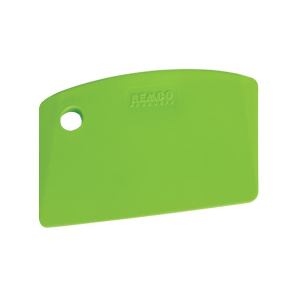 A white circle in a green circle on a Remco lime green polypropylene mini bench and bowl scraper.