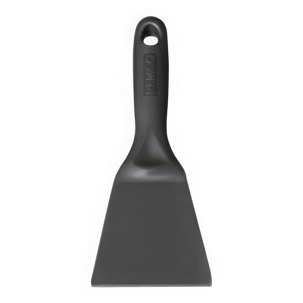 A black plastic Vikan hand scraper with a handle.