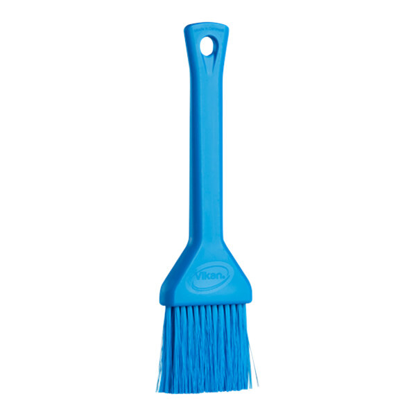 A blue Vikan pastry brush with a blue plastic handle.