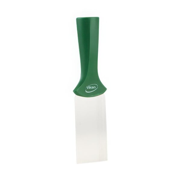 A white rectangular Vikan scraper with a green handle.