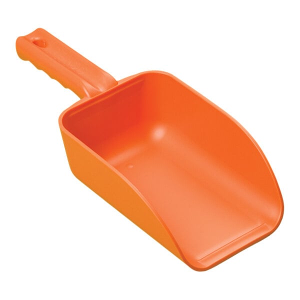 An orange plastic scoop with a handle.