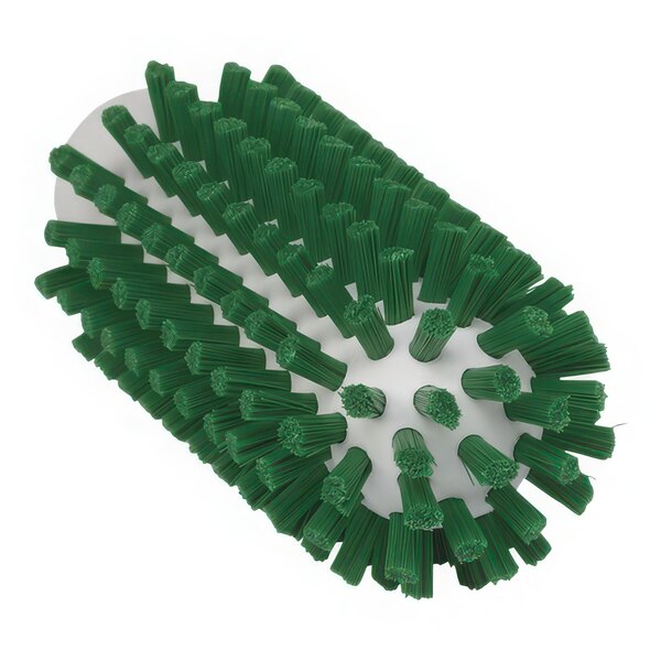 A green brush head with stiff bristles.