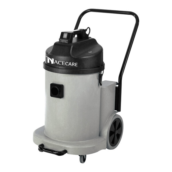 A grey and black NaceCare Solutions canister vacuum with wheels.