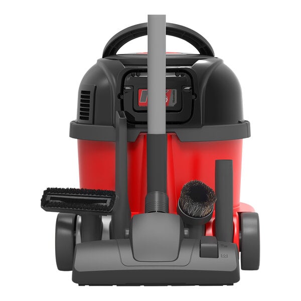 A red and black NaceCare Solutions cordless canister vacuum with a brush attachment.