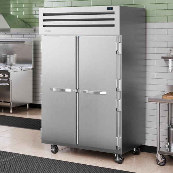 A large stainless steel True Spec Series reach-in freezer with two solid doors.