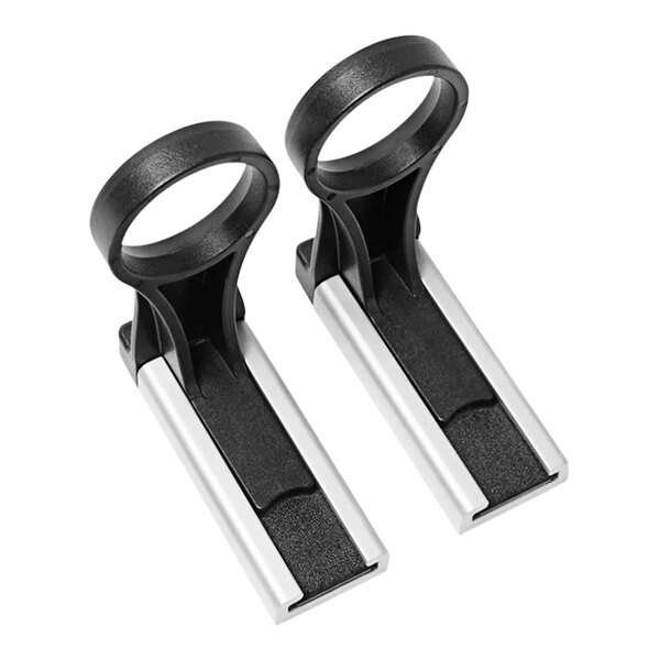 Two black and white plastic ZonePro mounting brackets on a counter.