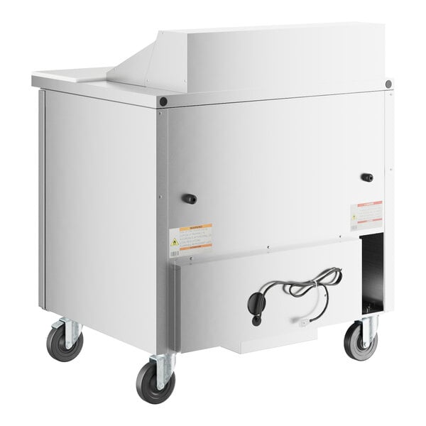 A True 2 door refrigerated sandwich prep table with wheels.
