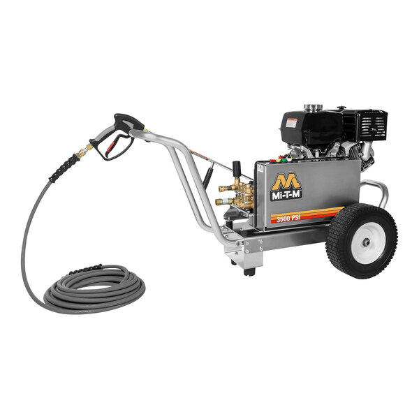 A Mi-T-M cold water pressure washer machine with a hose.