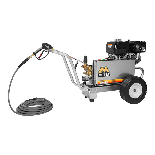 A Mi-T-M cold water pressure washer with a hose attached.