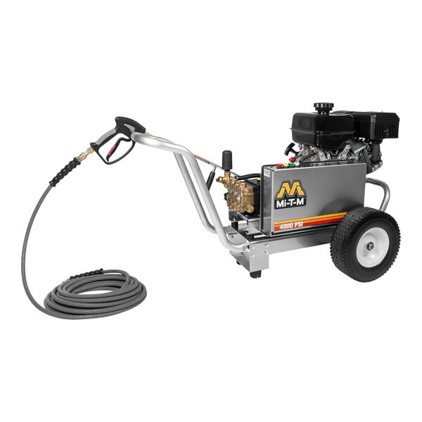 A Mi-T-M cold water pressure washer with a hose.