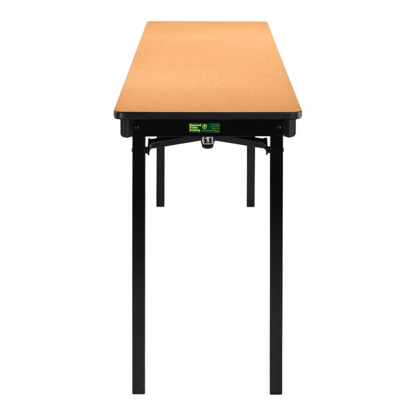 A National Public Seating Fusion Maple rectangular folding table with T-Mold edge.