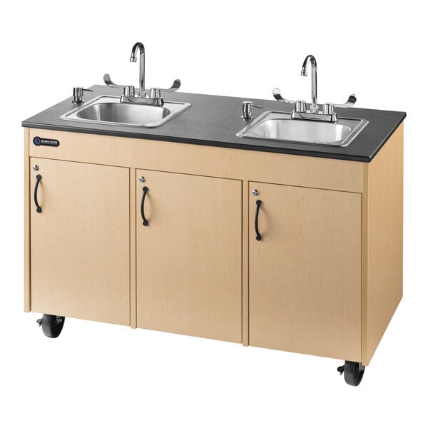 A maple double basin Ozark River portable sink with black countertops.