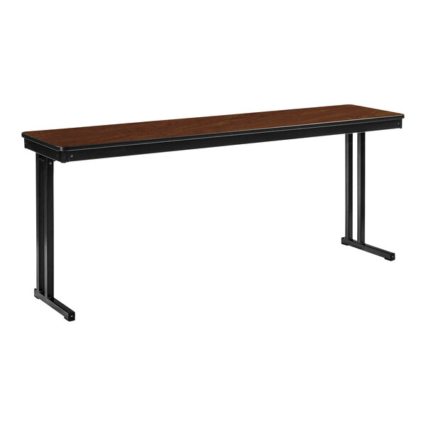 A brown rectangular National Public Seating table with black metal cantilever legs.