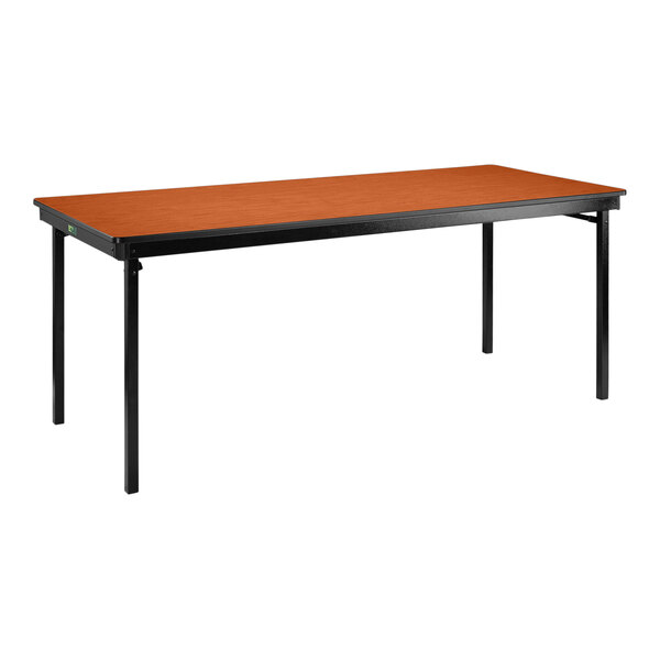 A National Public Seating rectangular folding table with a black frame and black legs.