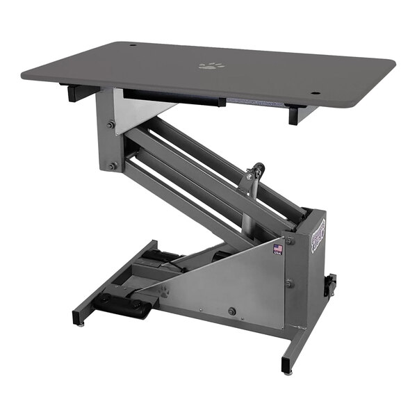 A grey grooming table with a black rectangular surface and a lift.