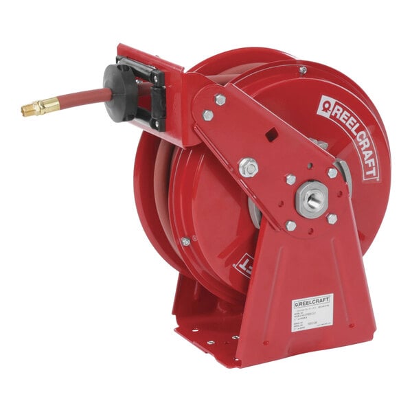 A red Reelcraft hose reel with a hose attached.