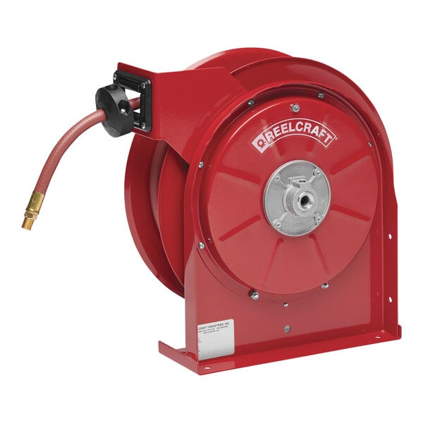 A red Reelcraft hose reel with a hose attached.