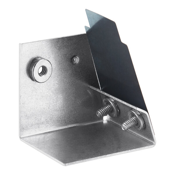 A metal corner with screws and bolts.