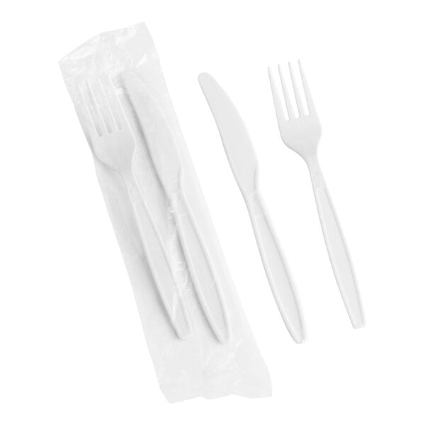 A white plastic wrapped fork and knife pack.