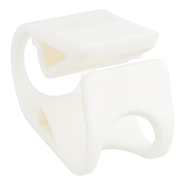 A white plastic clip with two holes on it.
