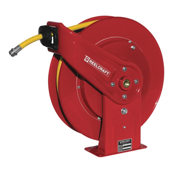 A red Reelcraft garden hose reel with a yellow hose attached.