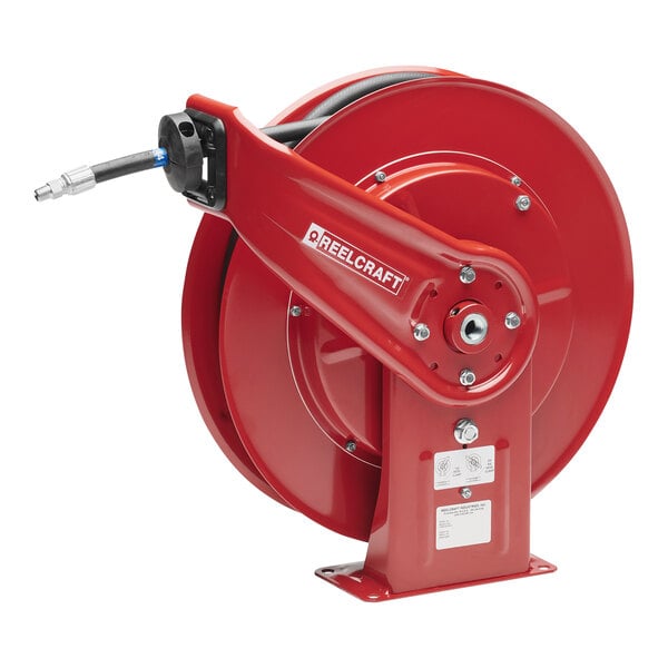 A red Reelcraft hose reel with a hose attached.