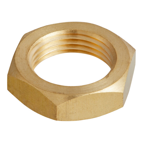A close-up of a brass hex nut.