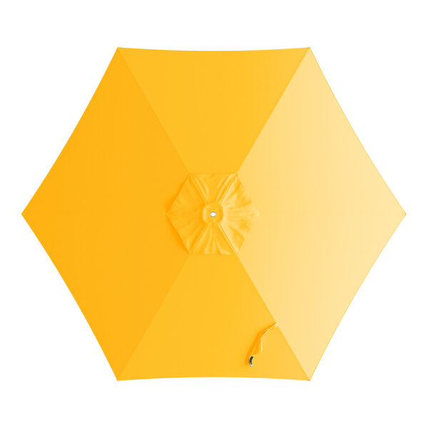 A yellow umbrella canopy for a round table with a handle on top.