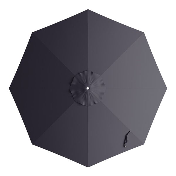 A navy umbrella canopy for a round table with a handle.