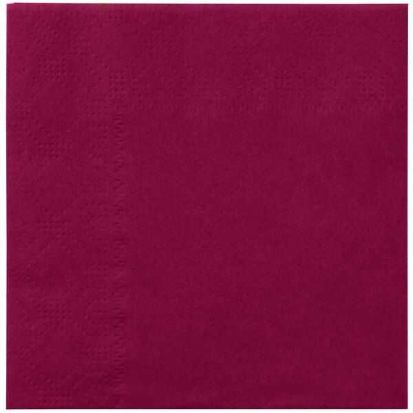 A close-up of a burgundy Hoffmaster beverage napkin.