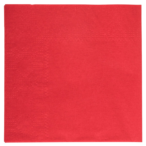 A red paper napkin with a square pattern.