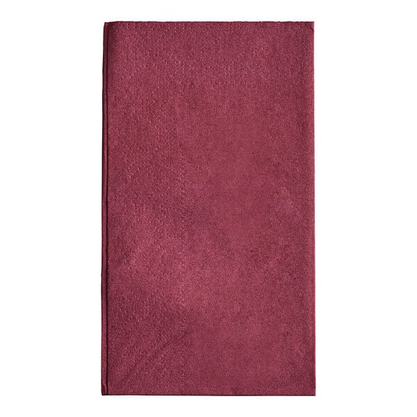A close-up of a red napkin on a white background.
