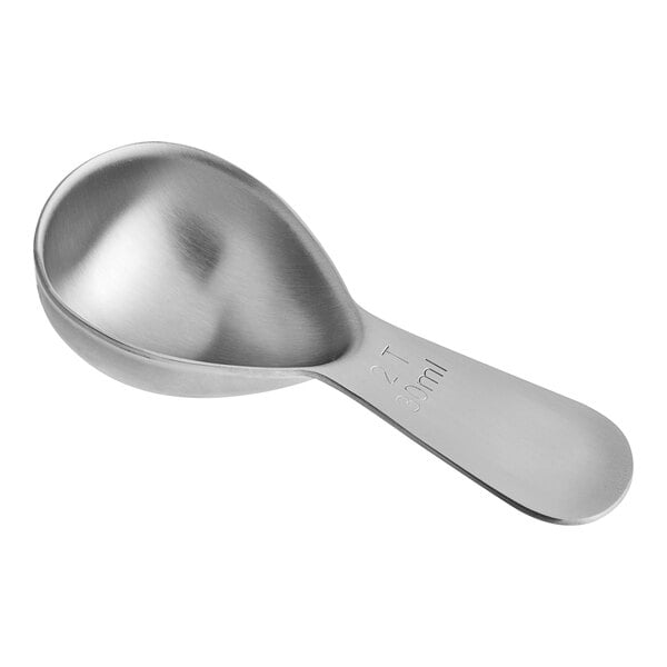 A silver Planetary Design stainless steel coffee scoop with a metal handle.