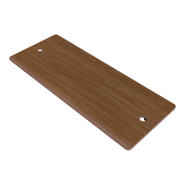 A brown melamine base shelf with holes in it.