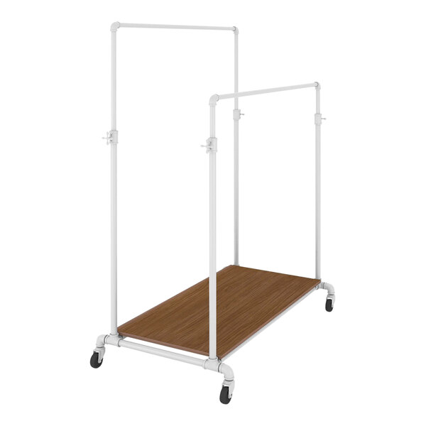 A white metal and wood clothing rack with white pipes and a brown wood shelf.