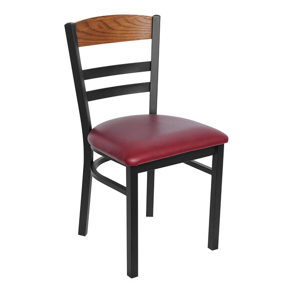 A black steel restaurant chair with a burgundy vinyl seat.